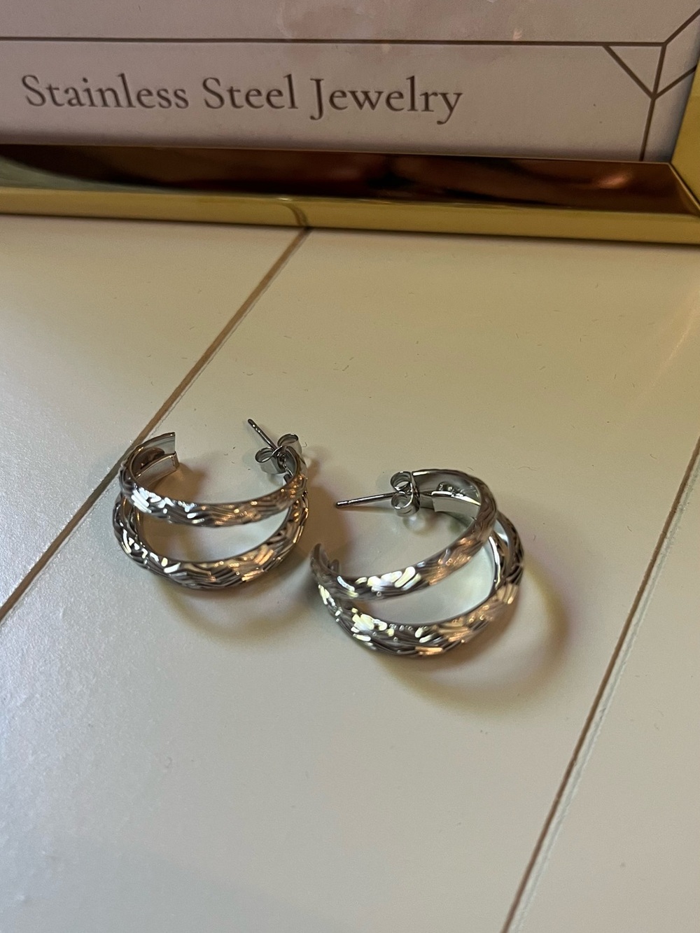 Mena & Co. Stainless Steel Silver Textured Hoop Earrings